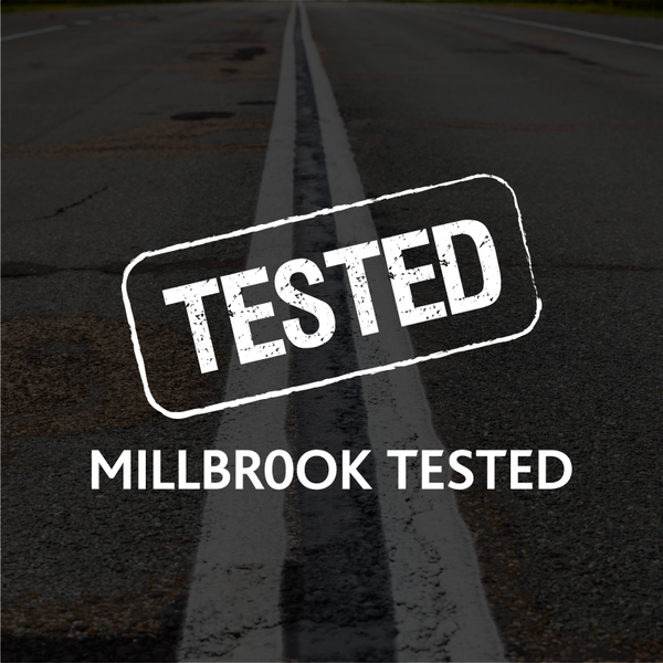 TESTED by Milbrook logo over road lines with dark overlay